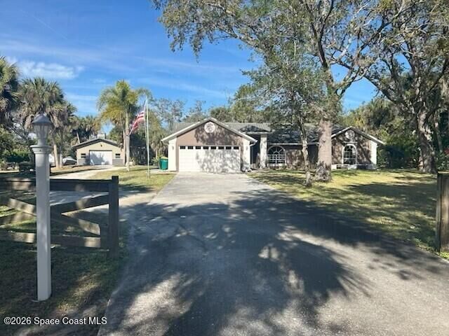 Property Photo: 9673 Fleming Grant Road FL 32976