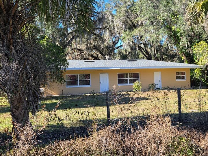 Property Photo:  1212 S State Road 415  FL 32168 