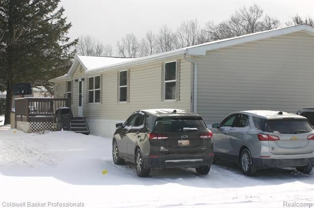 Property Photo: 147 Pheasant Run Street MI 48446