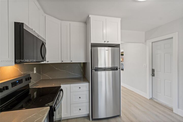 Property Photo:  811 NW 115th St  FL 33168 