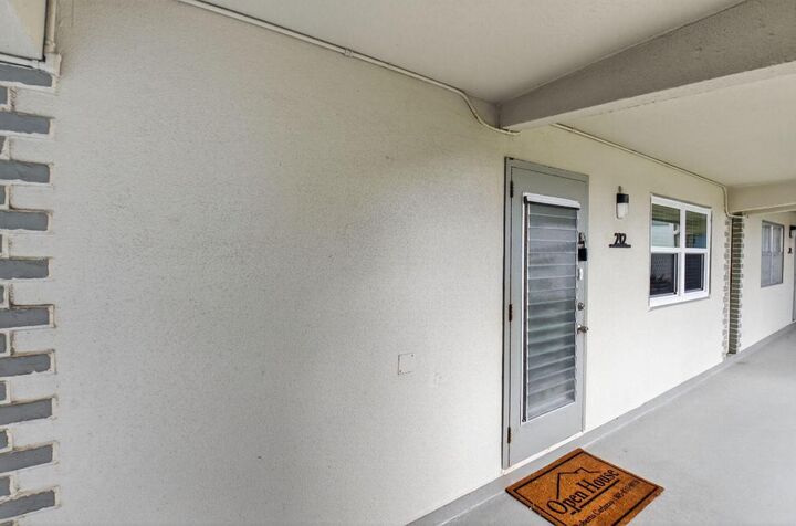 Property Photo:  212 Monaco Way E  FL 33446 