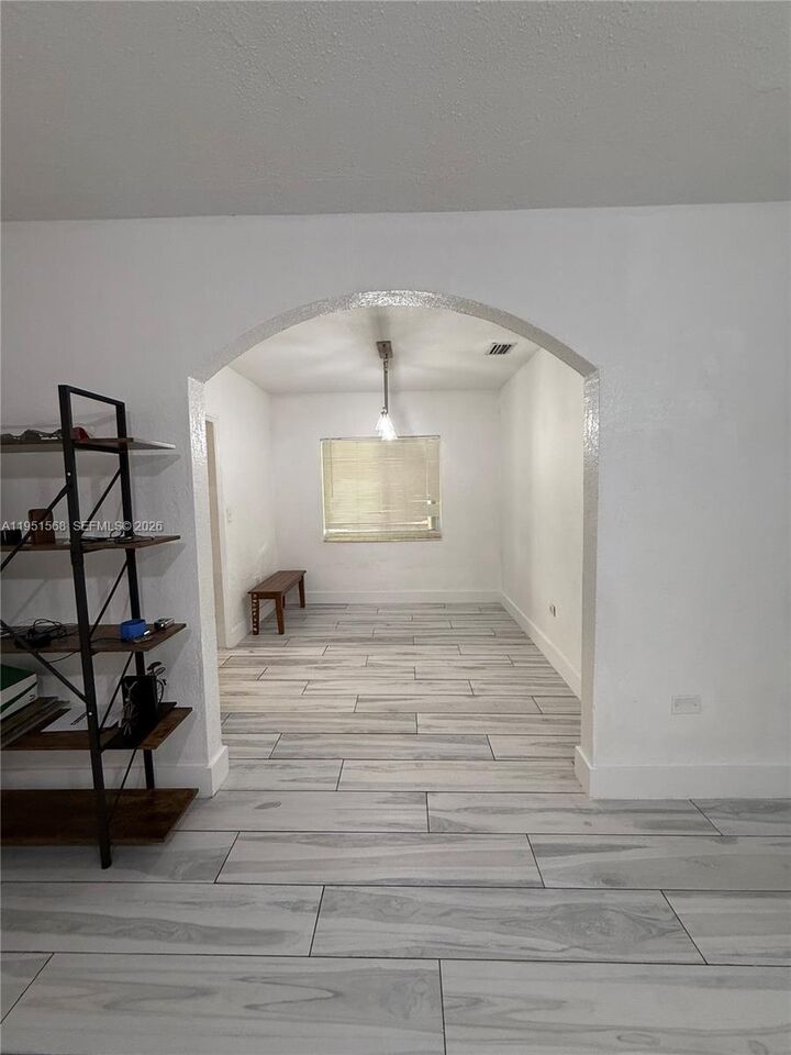 Property Photo: 1085 NW 48th St FL 33127