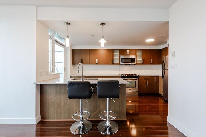 Property Photo: 8068 Westminster Highway 1801 BC V6X 0C6