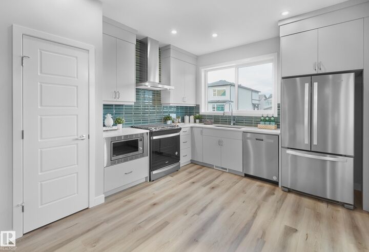 Property Photo: 1230 Cristall Way SW AB T6W 5T1