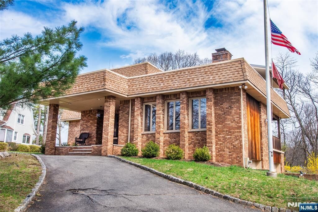 Property Photo:  845 Rifle Camp Road  NJ 07424 