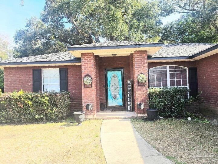 Property Photo: 8288 Groveland Ave FL 32534