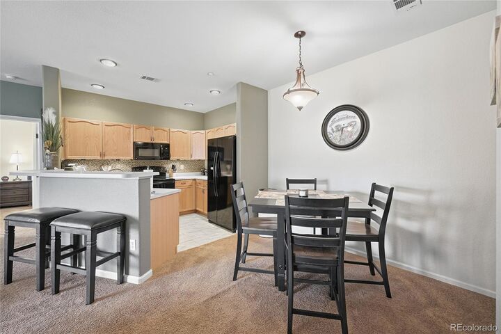 Property Photo:  8374 S Holland Way 206  CO 80128 