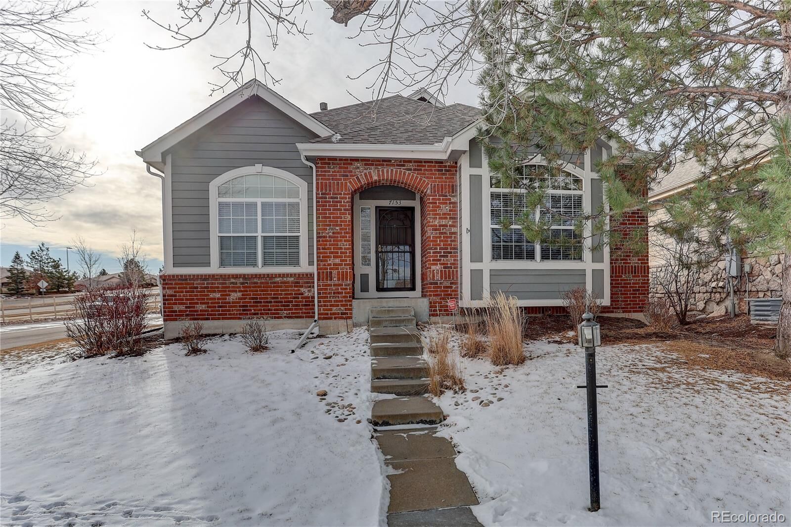 Property Photo: 7153 S Versailles Way CO 80016