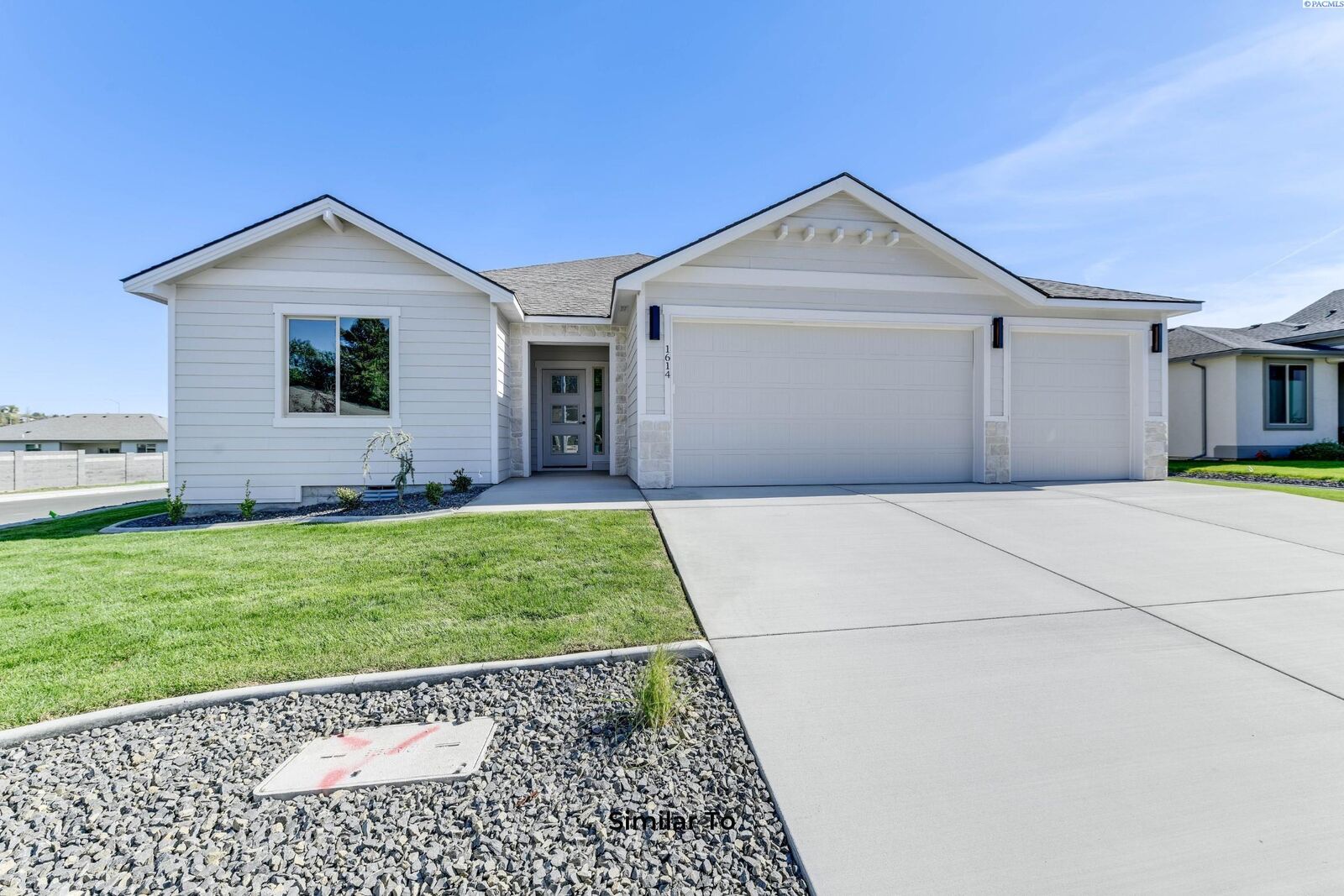 Property Photo:  10008 Redbud Dr  WA 99301 