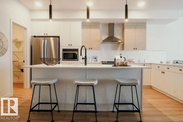 Property Photo:  7365 Klapstein Crescent SW  AB T6W 5R8 