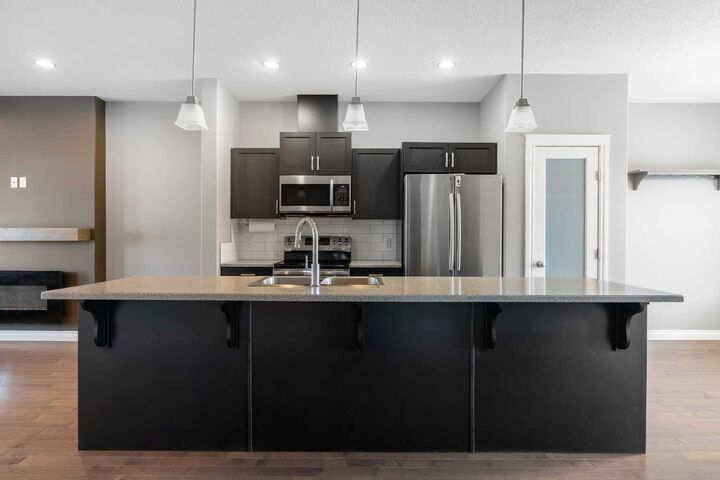 Property Photo:  425 Heritage Drive  AB T9K 1S4 