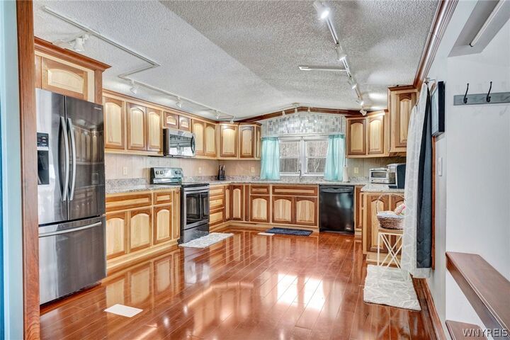 Property Photo:  8745 Stebbins Road  NY 14737 