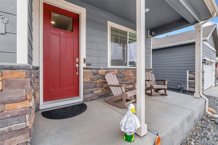 Property Photo:  211 Fox Street  CO 80102 