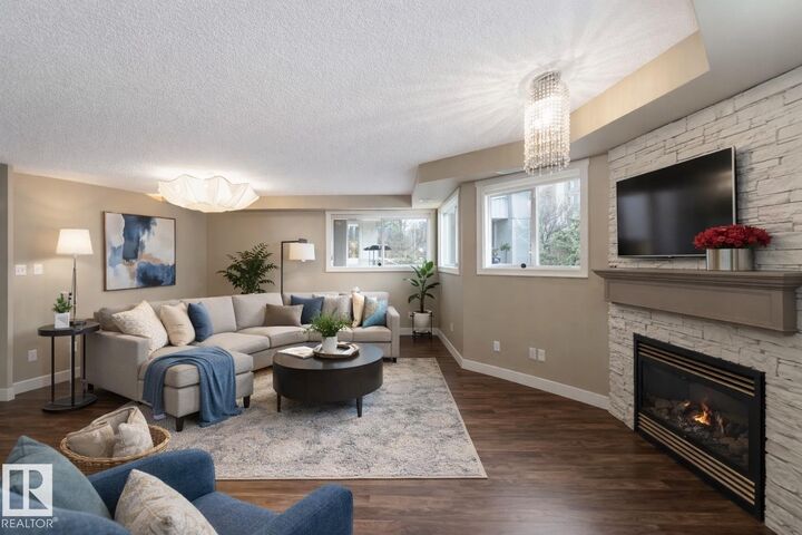 Property Photo:  10311 111 Street NW 113  AB T5K 2Y8 