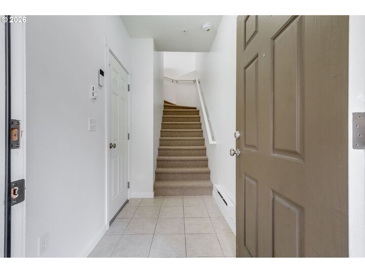 Property Photo:  10857 SW Canterbury Ln 202  OR 97224 