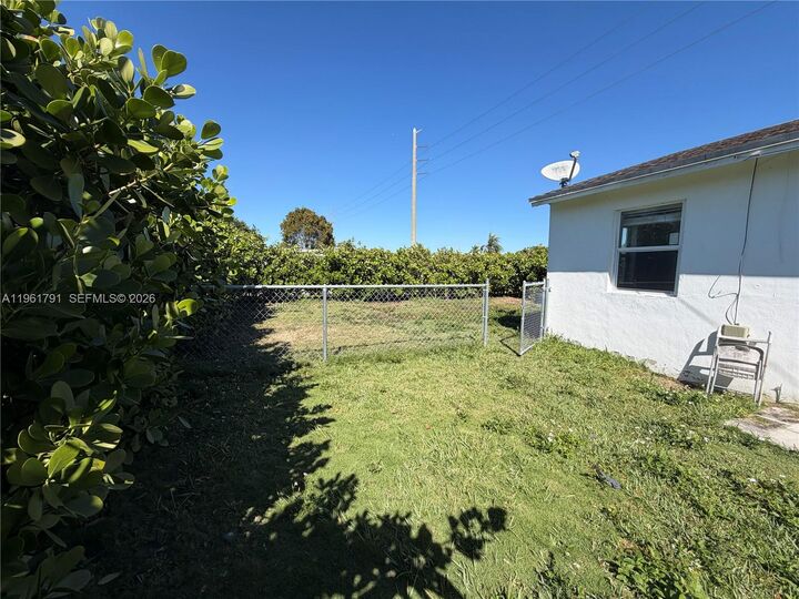 Property Photo:  11700 SW 221st St  FL 33170 