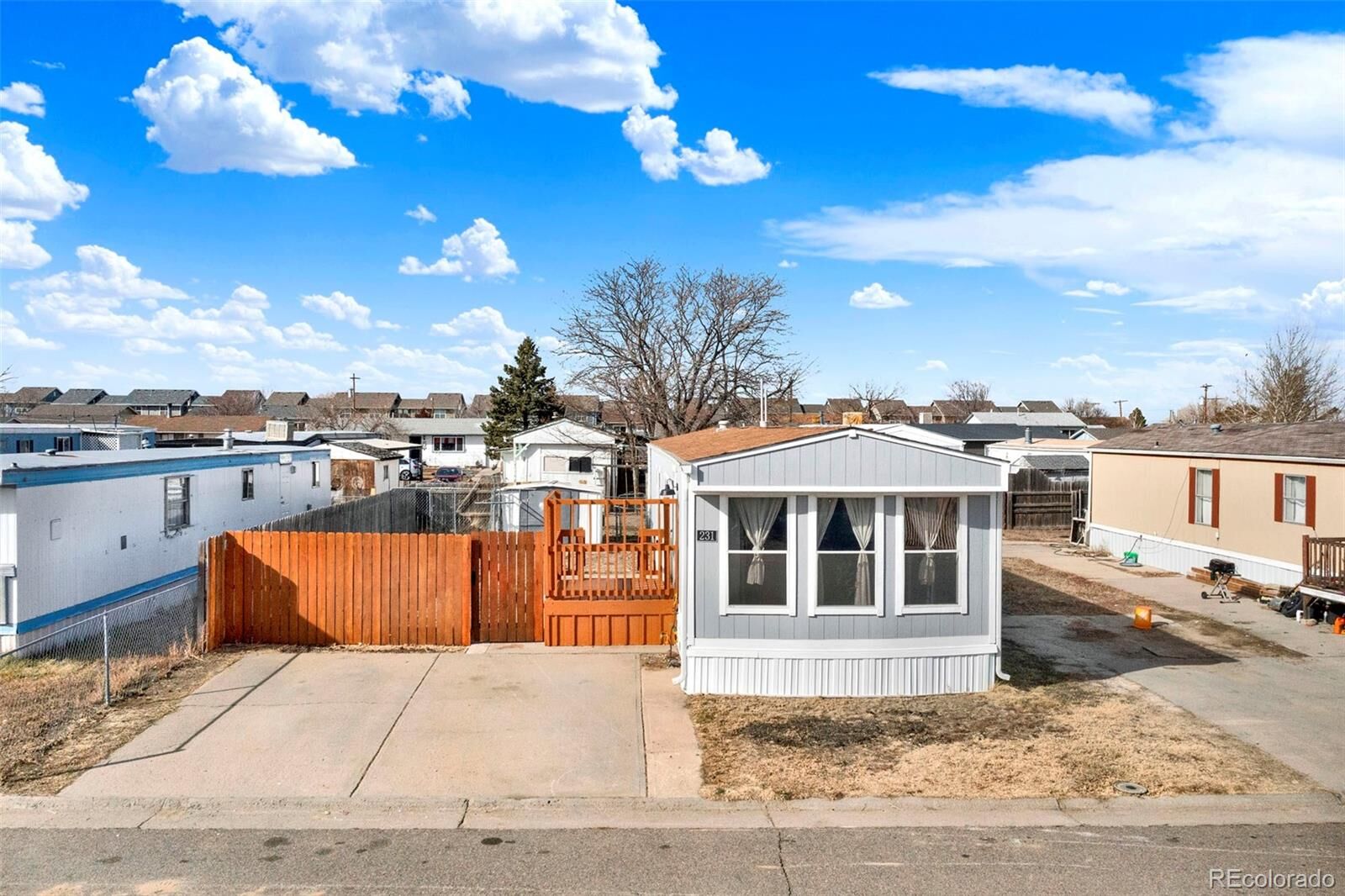 Property Photo:  231 Dahlia Street  CO 80102 