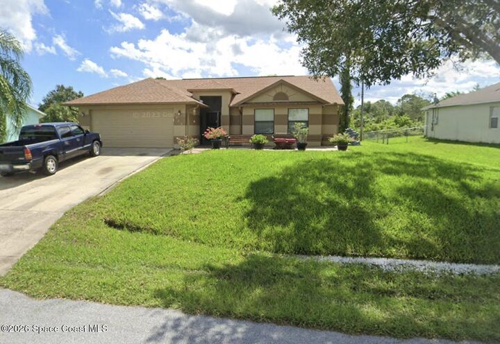 Property Photo:  1463 Santa Anna Street SE  FL 32909 