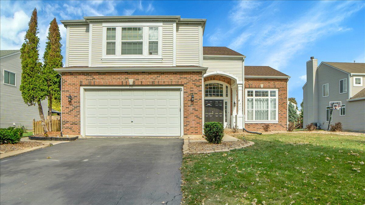 Property Photo:  711 Blossom Court  IL 60543 
