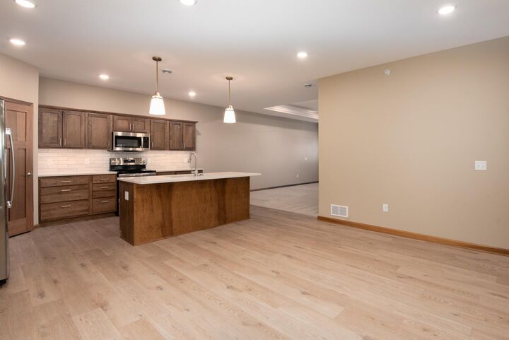 Property Photo:  3116 Bassett Drive  MN 56001 