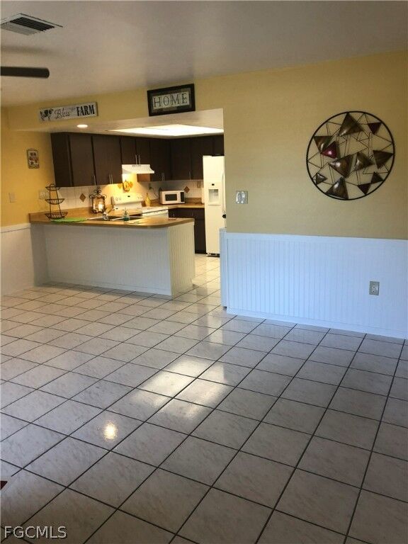 Property Photo:  1031 SE 9th Street 4  FL 33990 