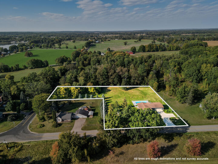 Property Photo:  8450 W Tamarack Road  MI 48850 