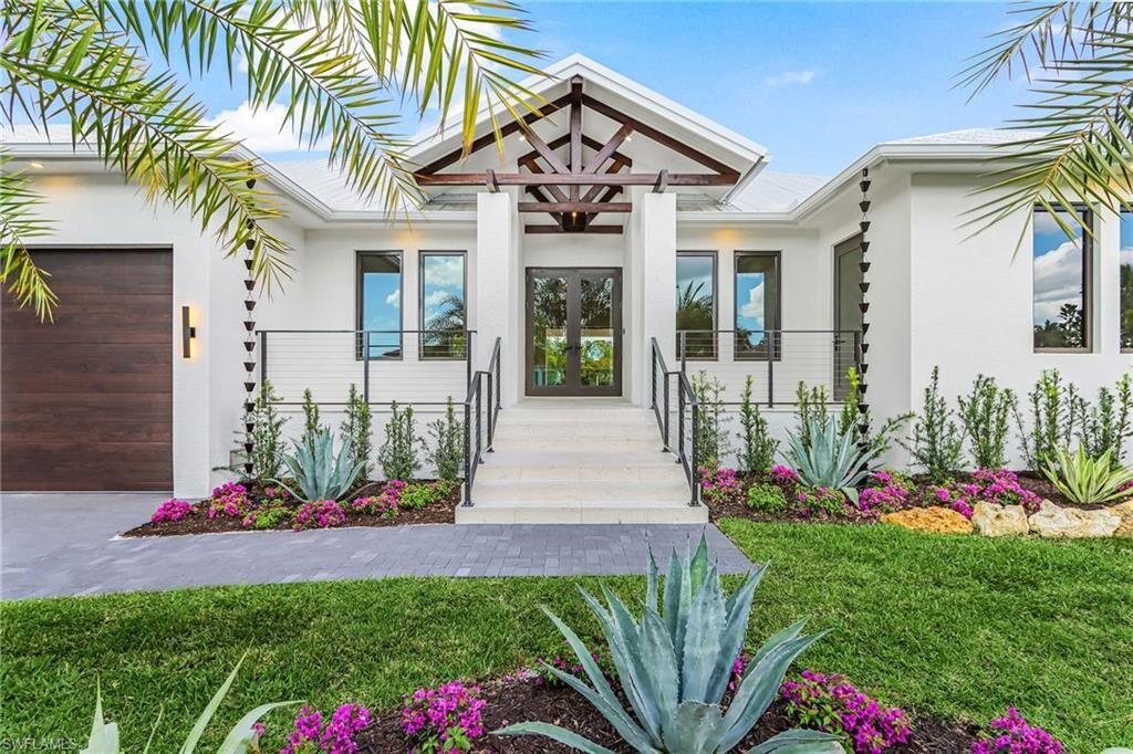 Property Photo:  2393 Longboat Dr  FL 34104 