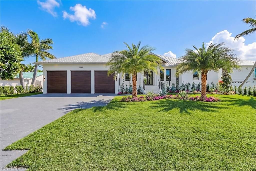 Property Photo:  2393 Longboat Dr  FL 34104 