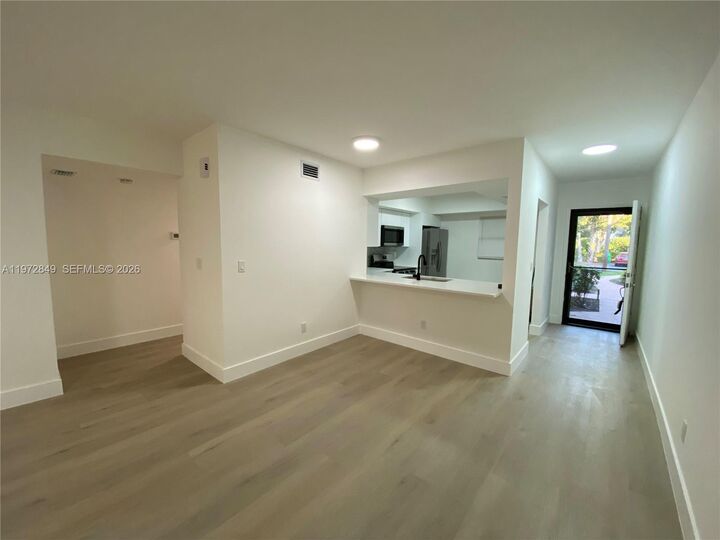 Property Photo:  1765 Courtyard Way 103  FL 33114 