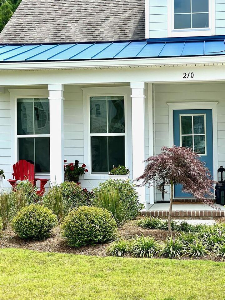 Property Photo:  210 Old Course Loop  VA 23310 