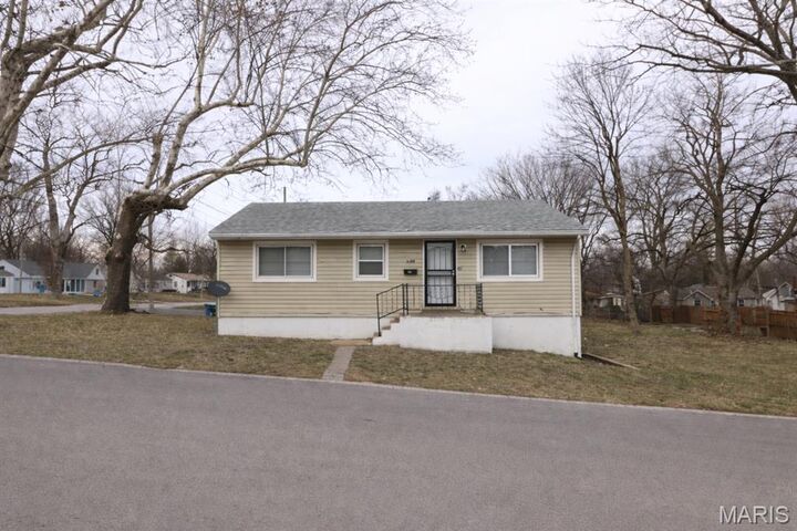 Property Photo:  6300 Evergreen Boulevard  MO 63134 