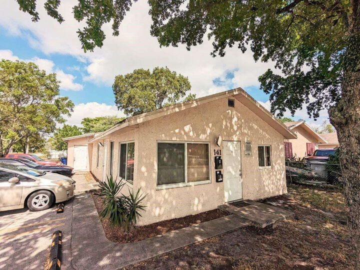 Property Photo: 141 NW 10th Street FL 33060