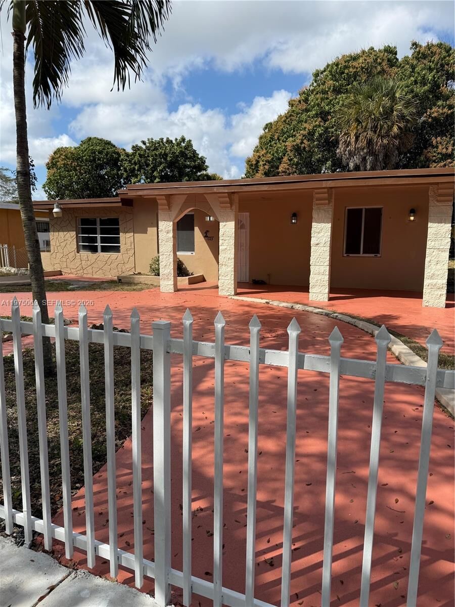 Property Photo: 1325 NW 124th St 1325 FL 33167