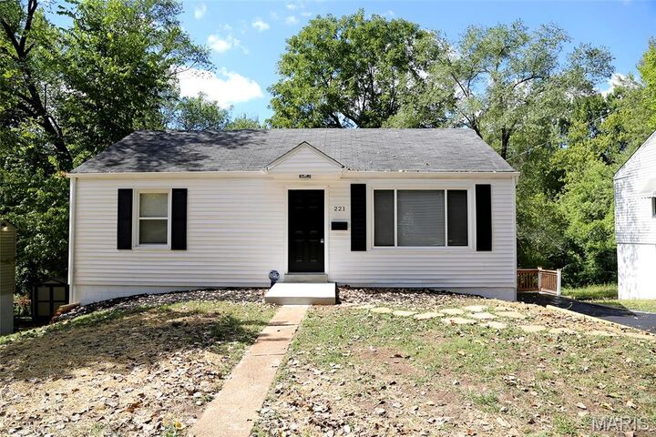 Property Photo:  221 S Harvey Avenue  MO 63135 