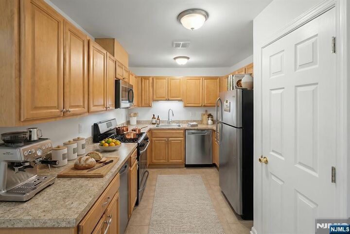 Property Photo:  497 Teal Plaza 497  NJ 07094 