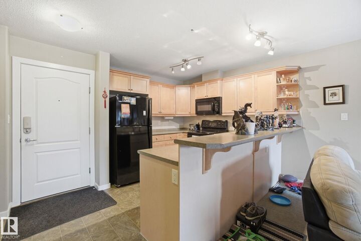 Property Photo:  278 Suder Greens Drive NW 208  AB T5T 6V6 