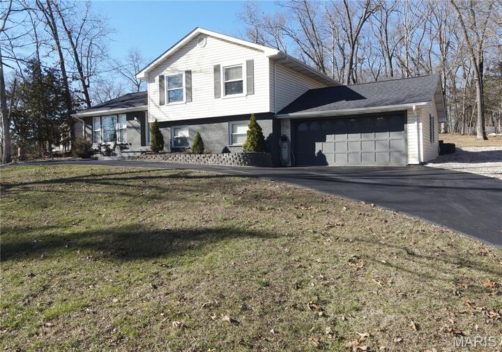 Property Photo:  5697 Lake Tishomingo Road  MO 63050 