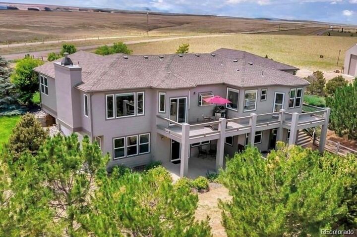 Property Photo: 992 South County Road 129 CO 80102