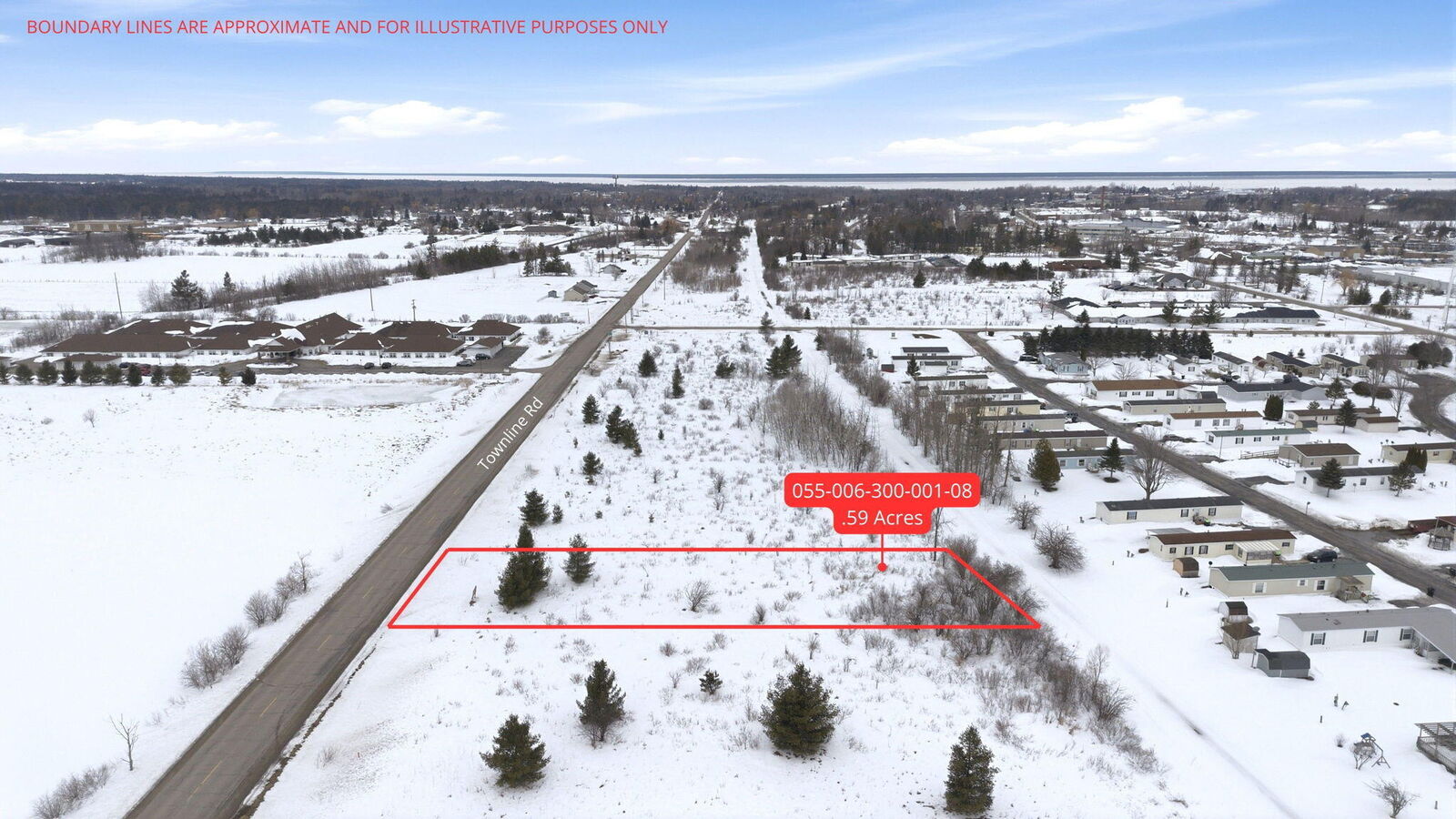 Property Photo:  V/L 0.59ac Townline Road  MI 49721 