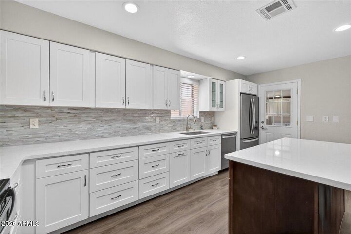Property Photo:  8725 E Jackrabbit Road  AZ 85250 