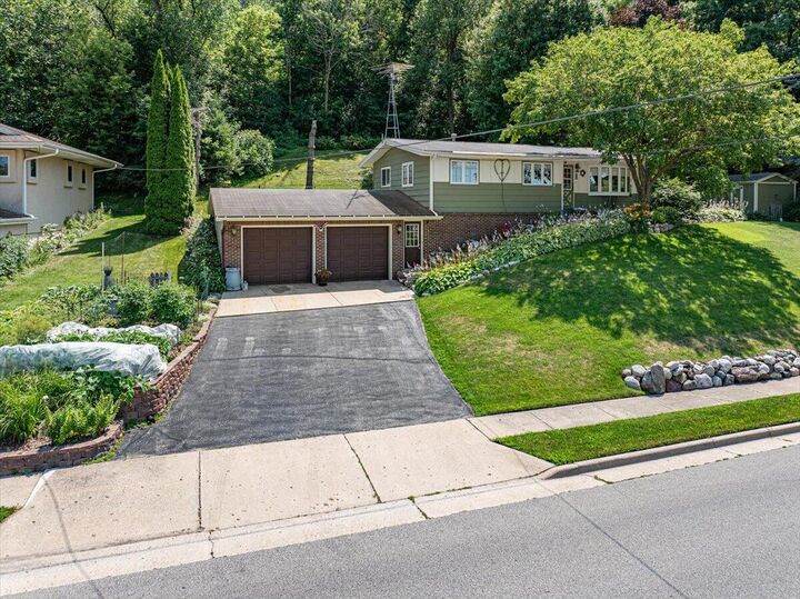 Property Photo:  295 Hartford Rd  WI 53086 