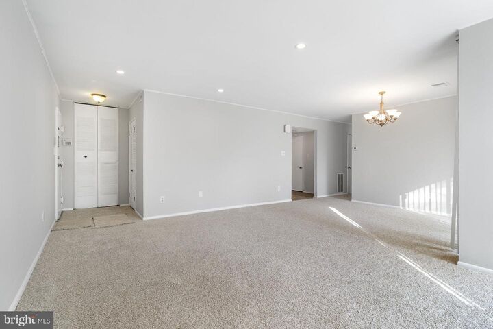 Property Photo:  10239 Prince Place 26-102  MD 20774 