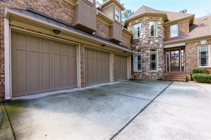 Property Photo:  2709 Rustling Pines Court NE  GA 30062 