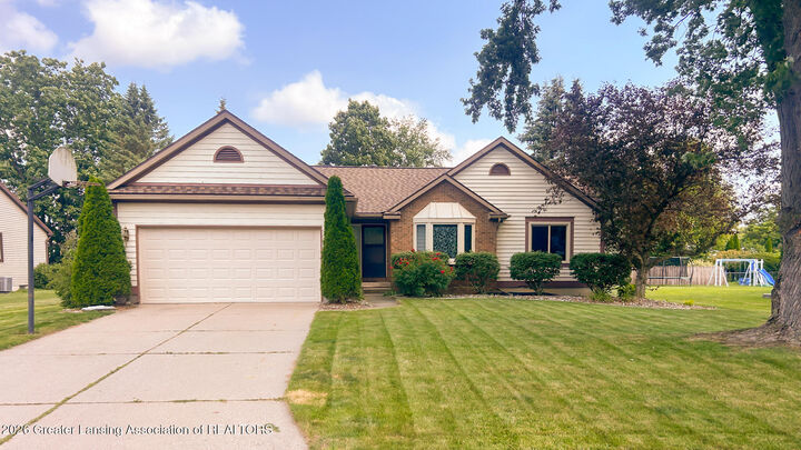 Property Photo:  5040 Runnymede Drive  MI 48842 