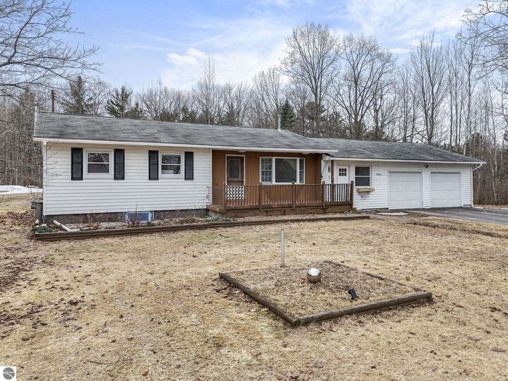 Property Photo:  4856 M-55  MI 49601 