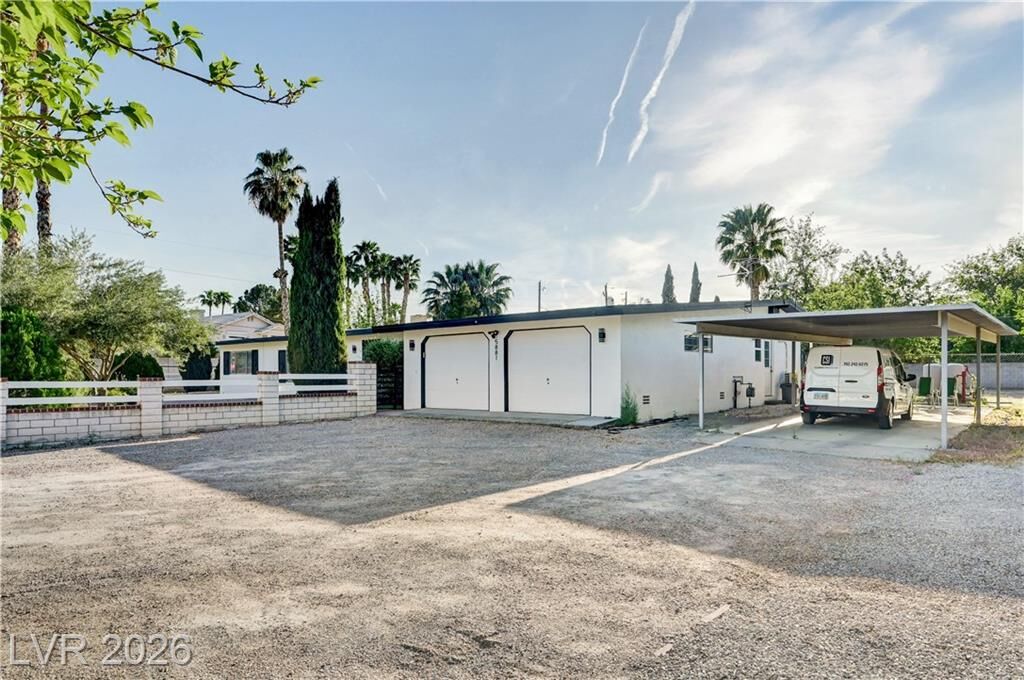 Property Photo:  5881 South Sandhill Road  NV 89120 