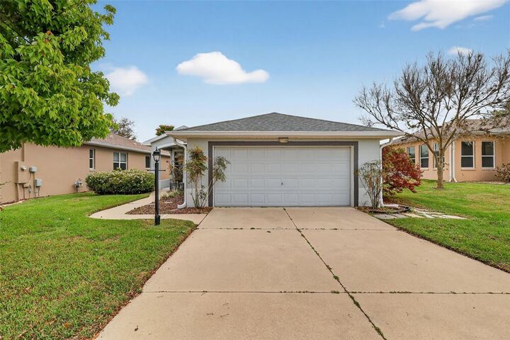 Property Photo: 27106 Greenfly Orchid Lane FL 34748