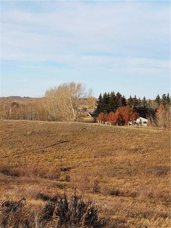 Property Photo: 264212 Lochend Road NW AB T4C 1A2
