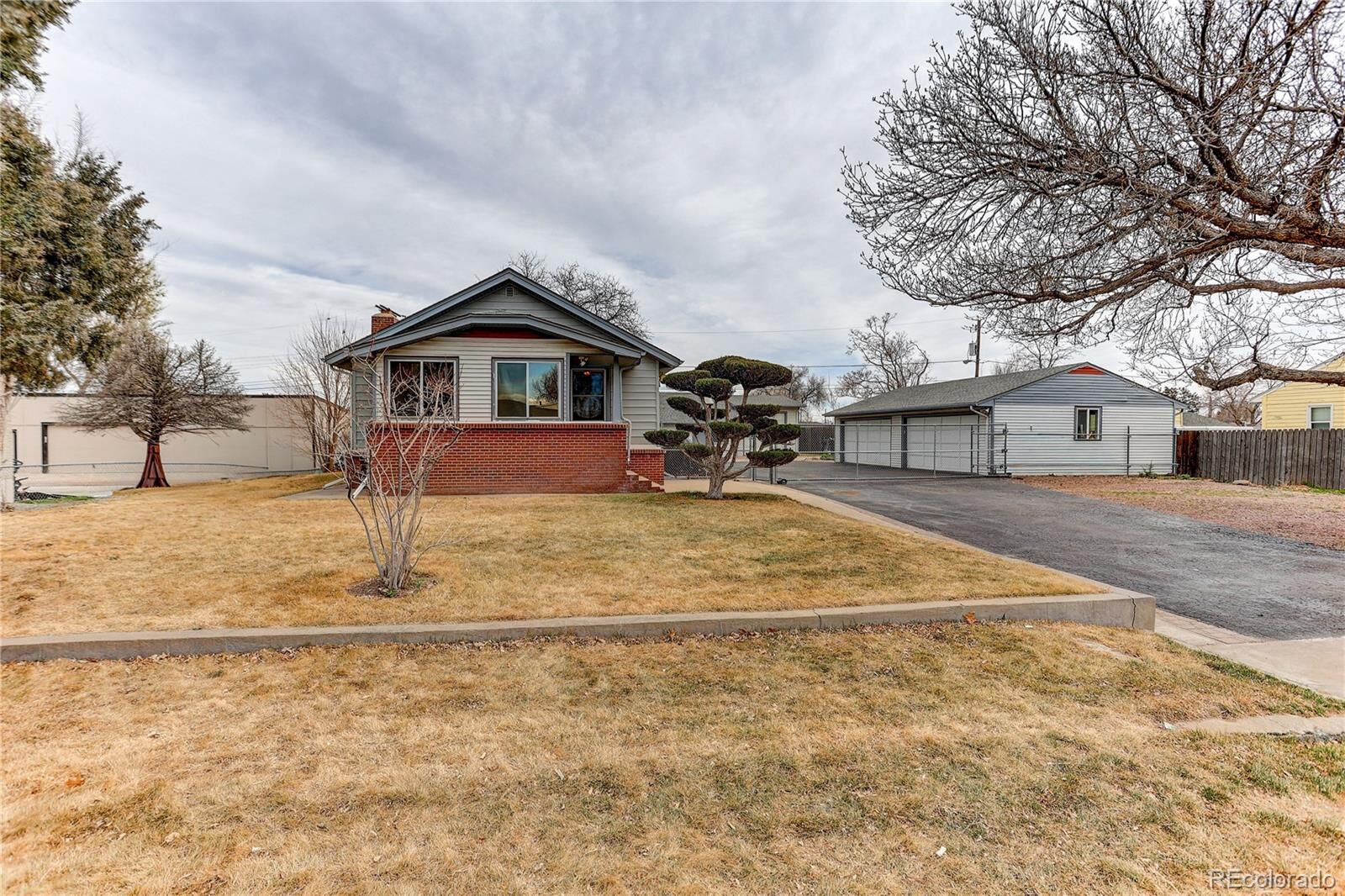 Property Photo:  6170 N Oneida Street  CO 80022 