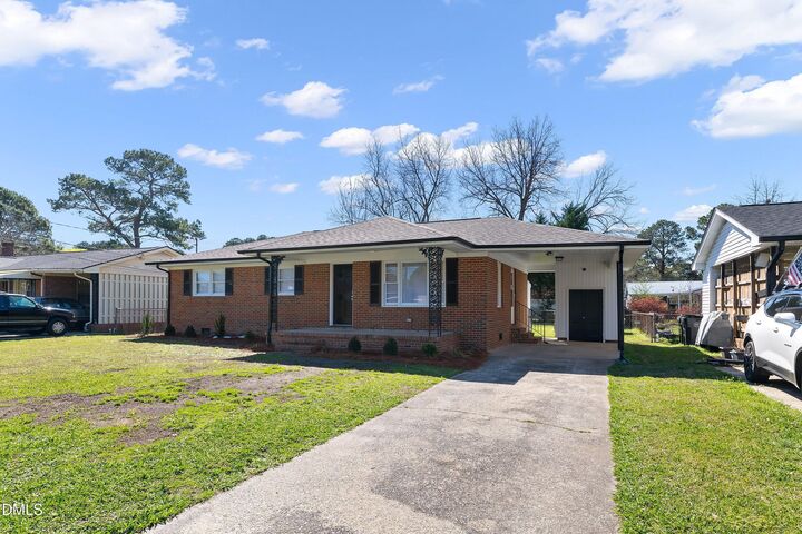 Property Photo:  212 Bunche Drive  NC 27530 